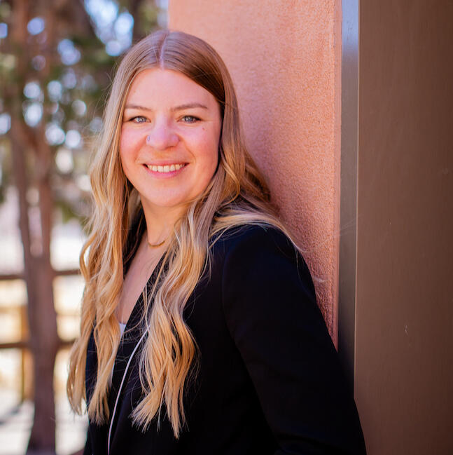 A profile picture of Stephanie Cain, a white female with long blonde hair.